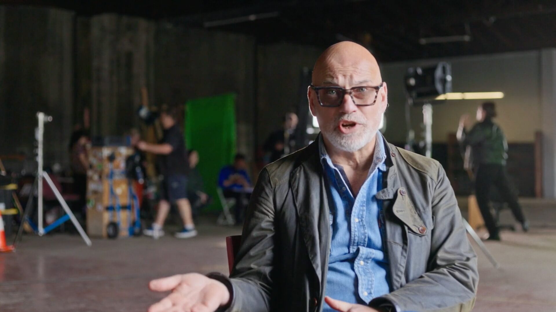 On-set interview setup for Make It Here, crew and green screen behind
