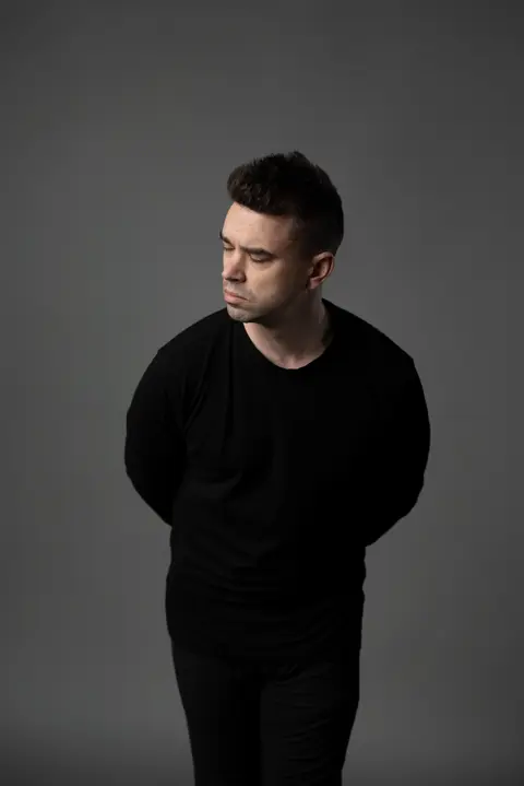 Introspective studio portrait